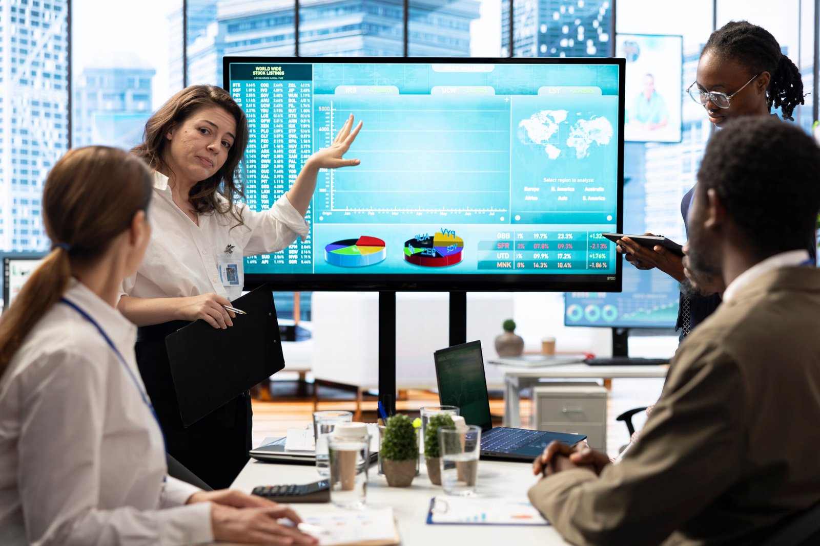business associates collaborating at the conference table in boardroom